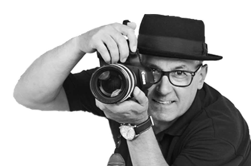 Foto von Fernando Baptista mit Kamera und Hut